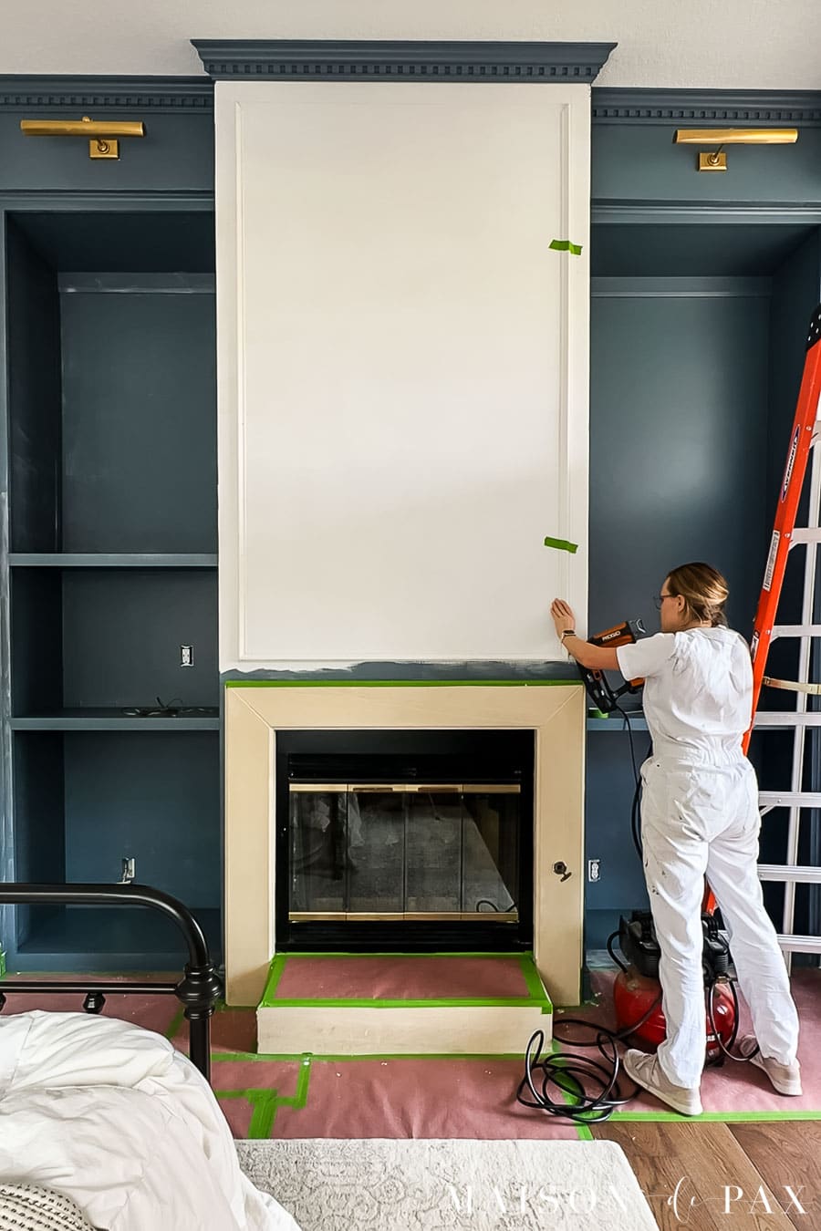 adding panel moulding (aka picture frame molding) to a fireplace between bookcases