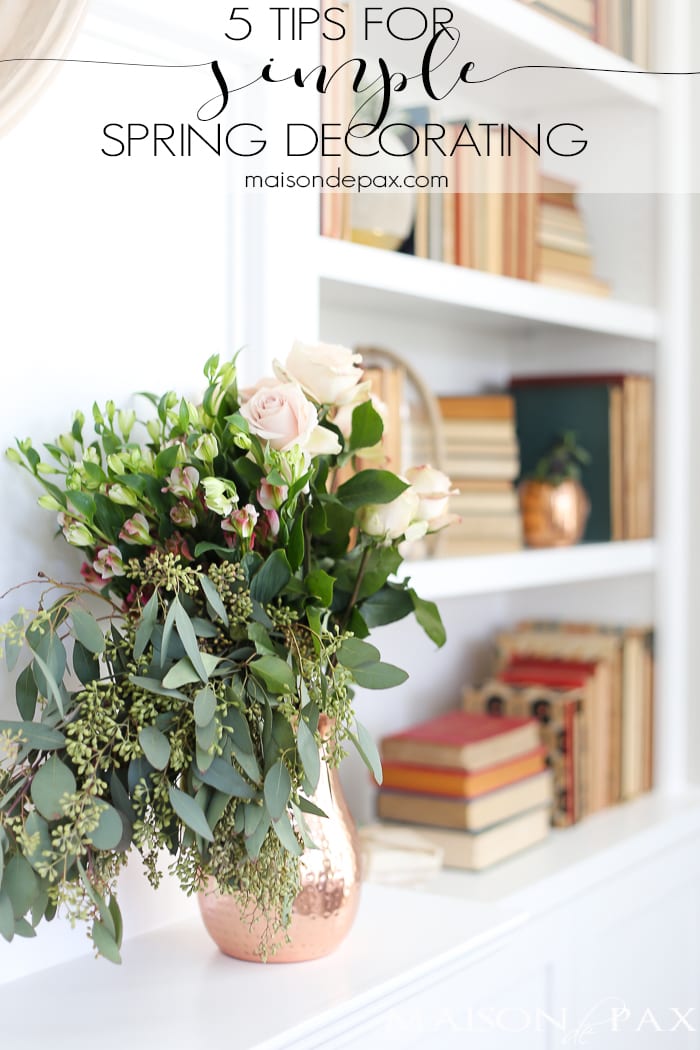 This casually elegant living room is all set to go for spring! Use these simple spring decorating ideas to get your home ready for spring.