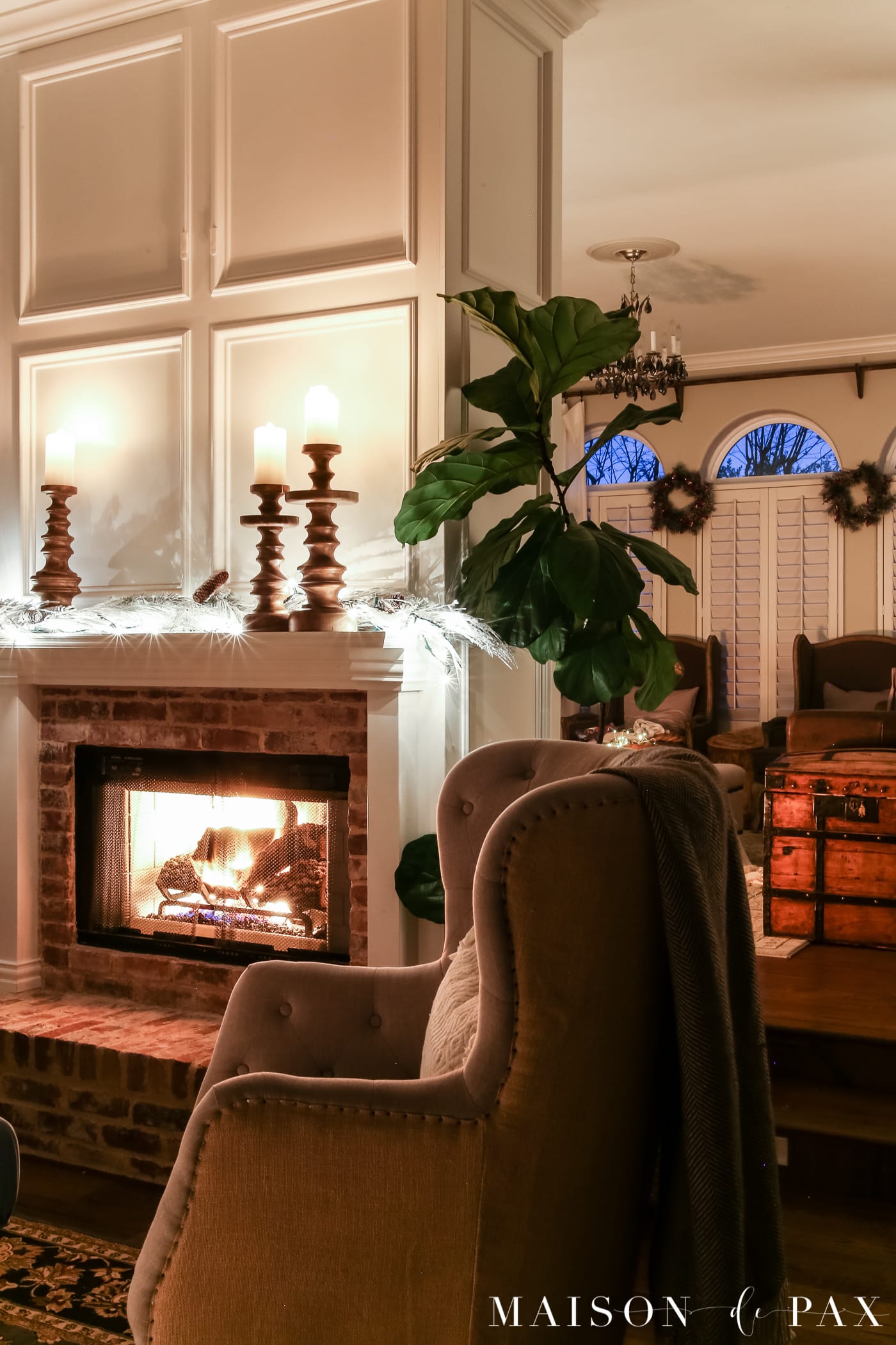 gorgeous fireplace: gorgeous Christmas lights at night in these 25+ home tours #christmasnightstour #holidayhometour #christmaslights
