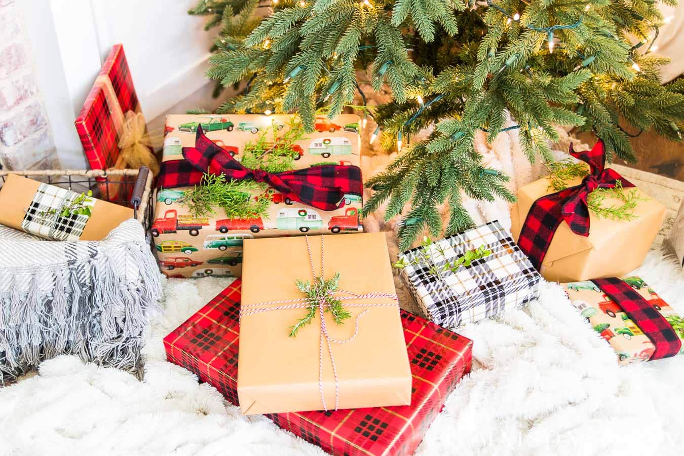 beautifully wrapped Christmas gifts with red and white plaid and brown kraft paper | Maison de Pax