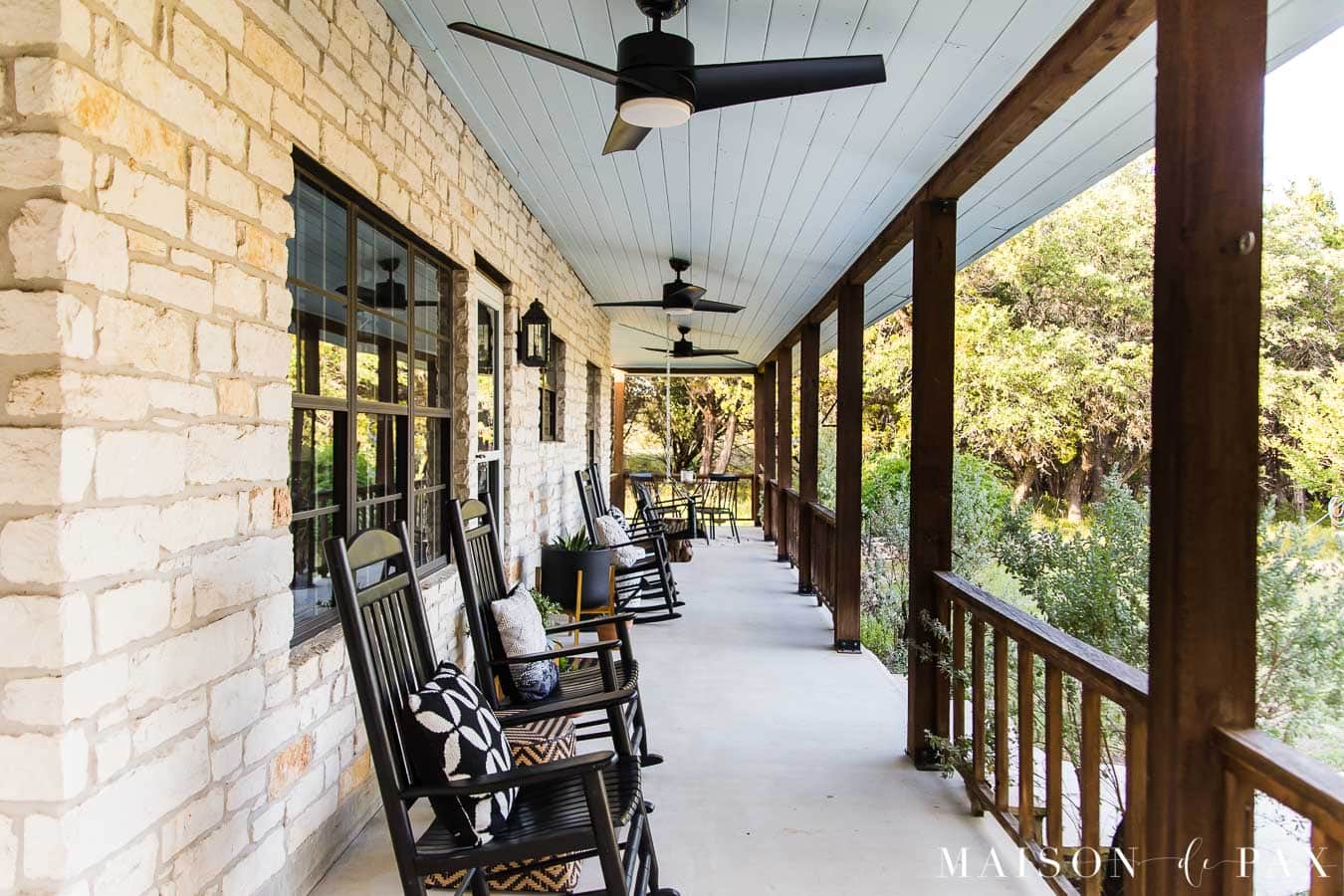 austin stone house with wrap around front porch | Maison de Pax