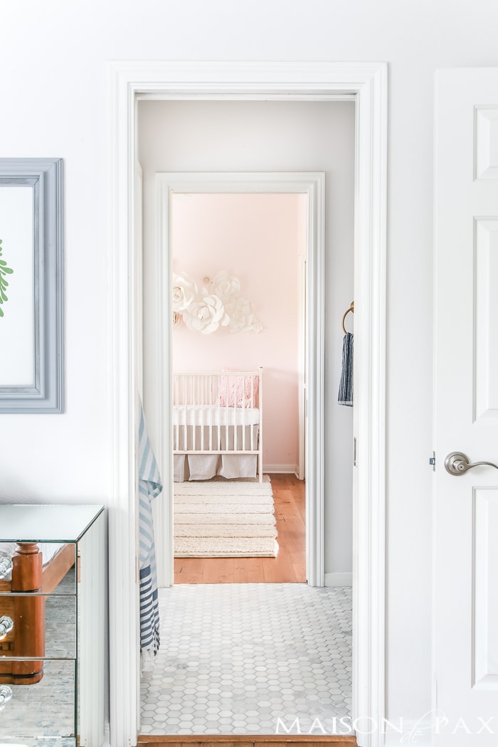 jack and jill bath with marble hex flooring is perfect between these two little girls' rooms- Maison de Pax