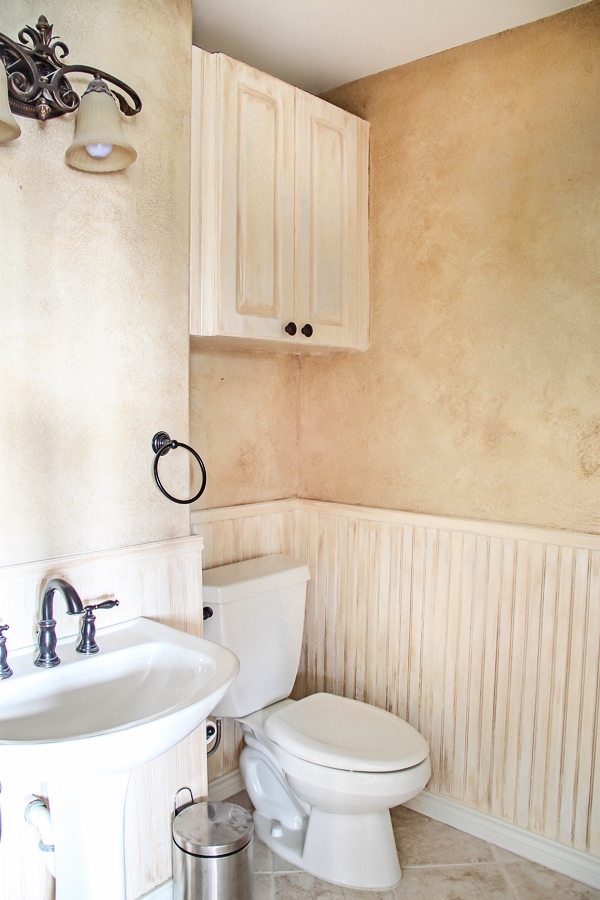 The powder room... before. Come see how this 1990's home was transformed and updated beautifully!