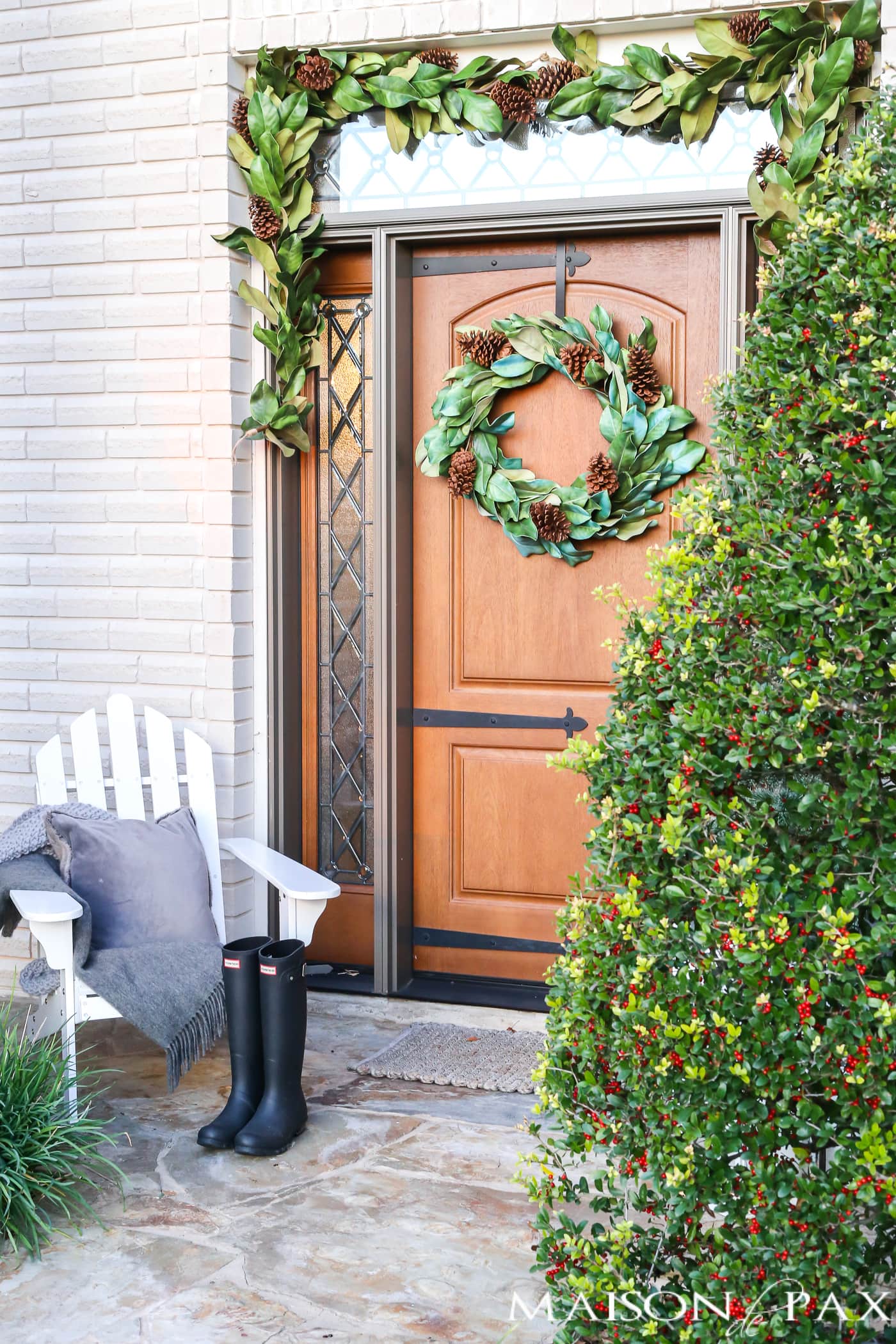 adirondack chair with throw and pillow for holiday front porch #holiday porch
