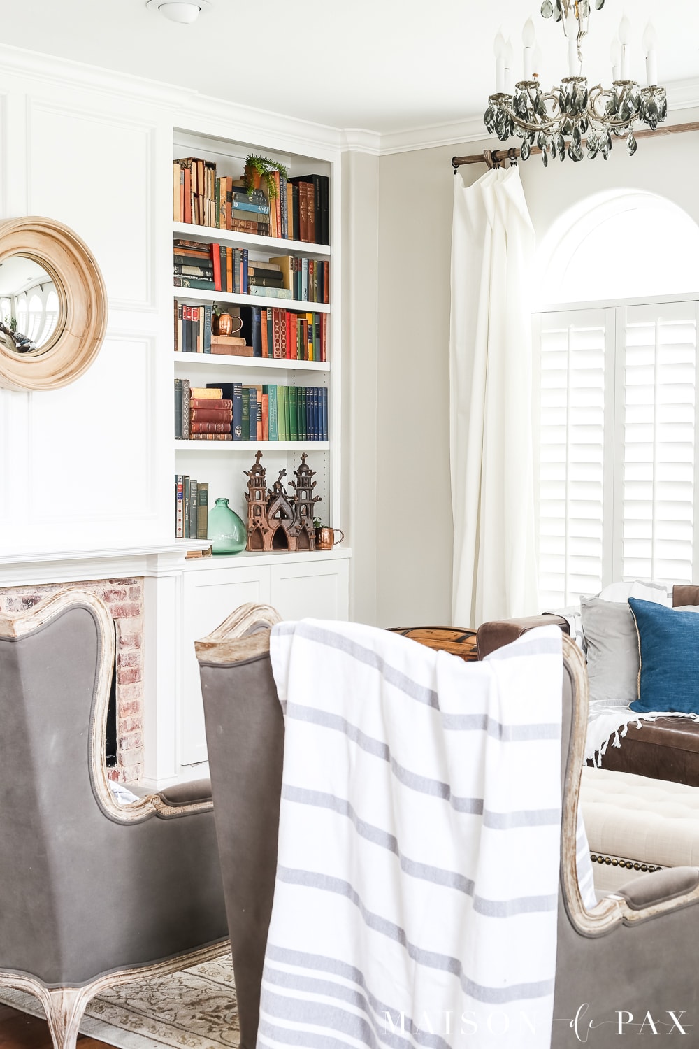 brown leather couch with light gray walls | Maison de Pax