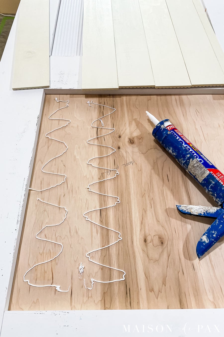 attach fluted trim with construction adhesive