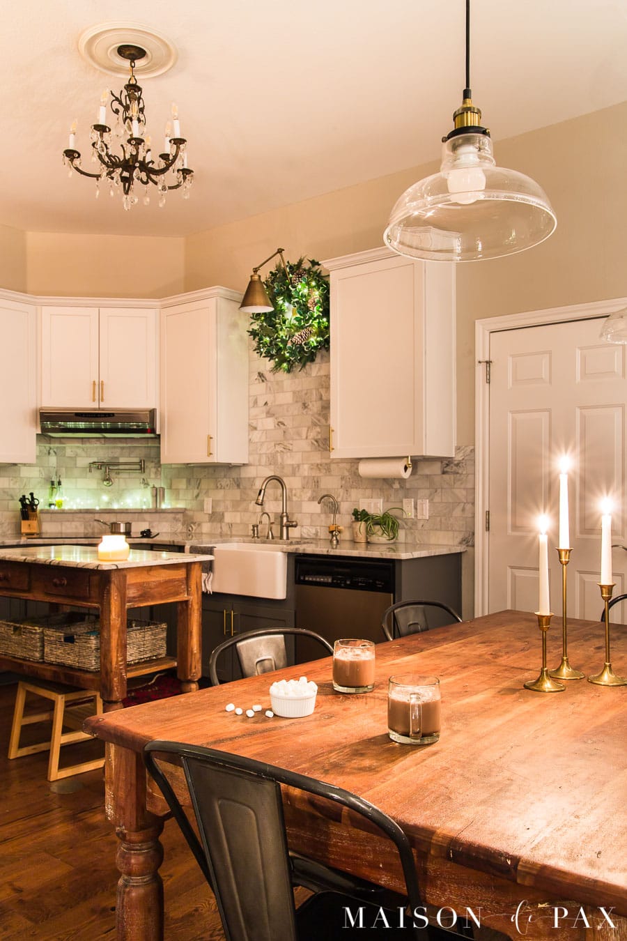 candles and hot chocolate in a kitchen lit for Christmas | Maison de Pax