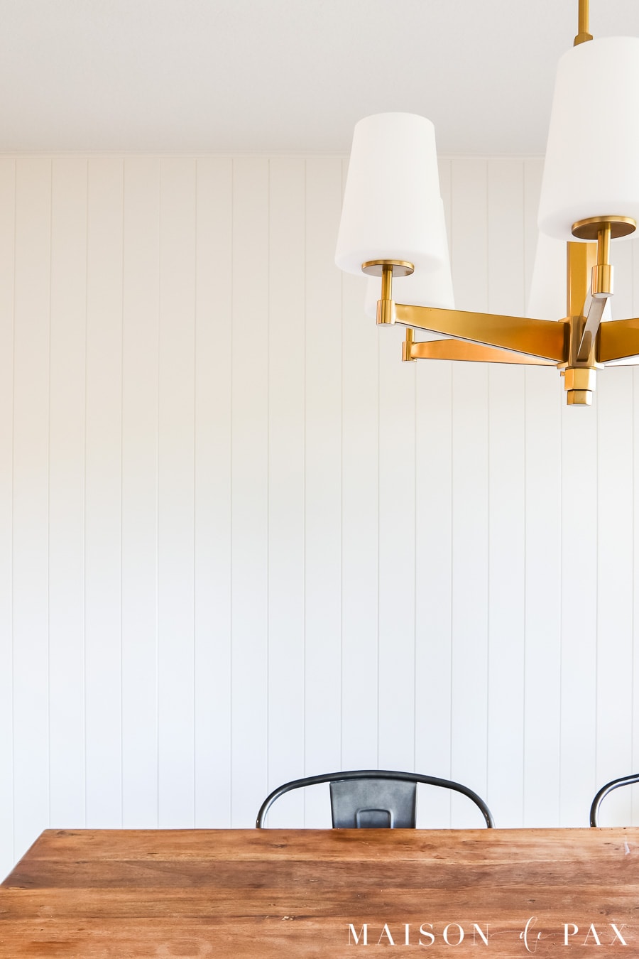 vertical plank paneling in a kitchen and breakfast room