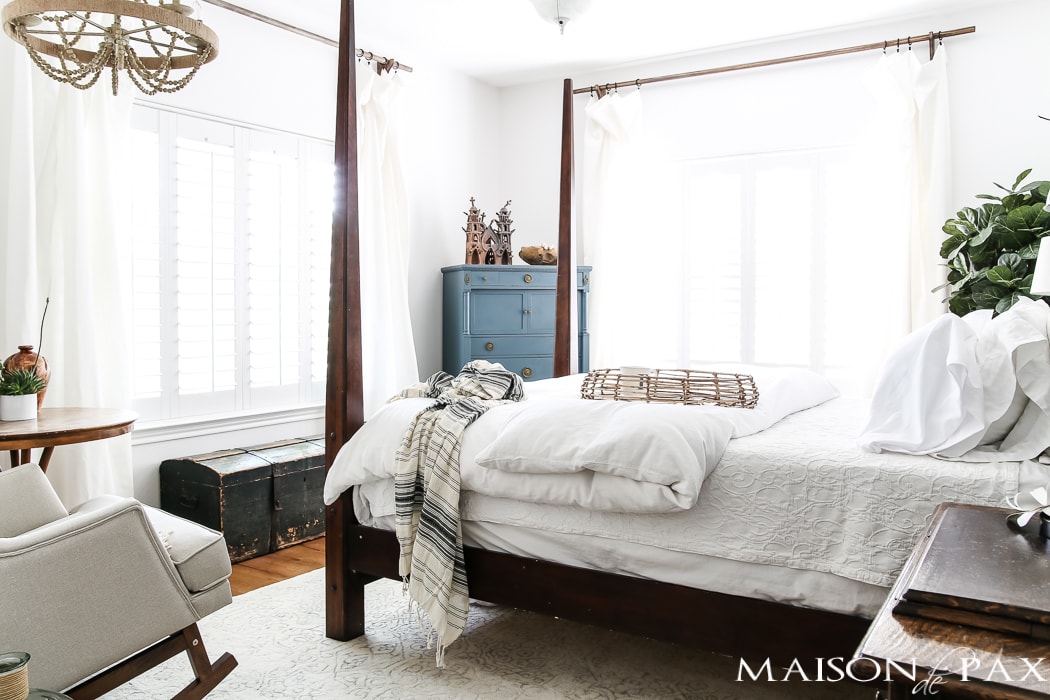 Relaxed, natural, neutral master bedroom with lots of white and touches of boho texture... the perfect retreat!