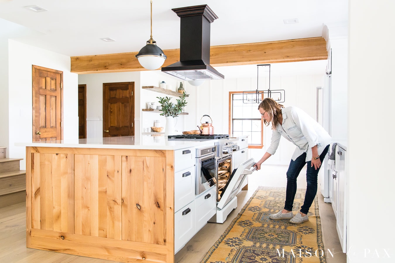 white kitchenaid commercial range and microwave drawer in island | Maison de Pax