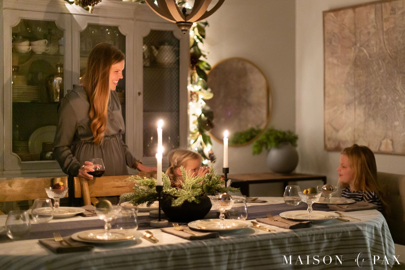 family Christmas dinner by candlelight