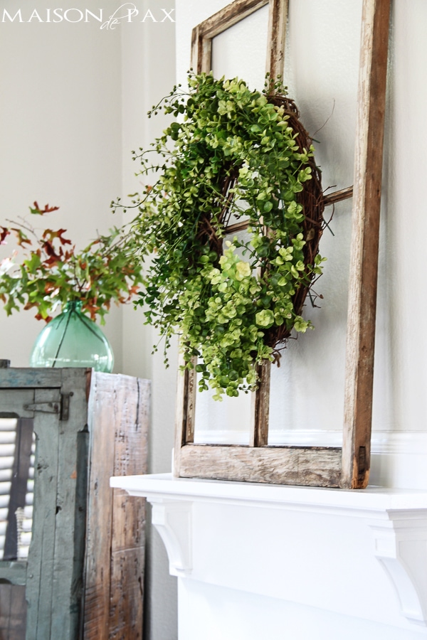 I love this fireplace makeover! Some paint, a simple mantel, and a total transformation of this formerly dated black box fireplace | aiweb9ygdry.cmersite.com