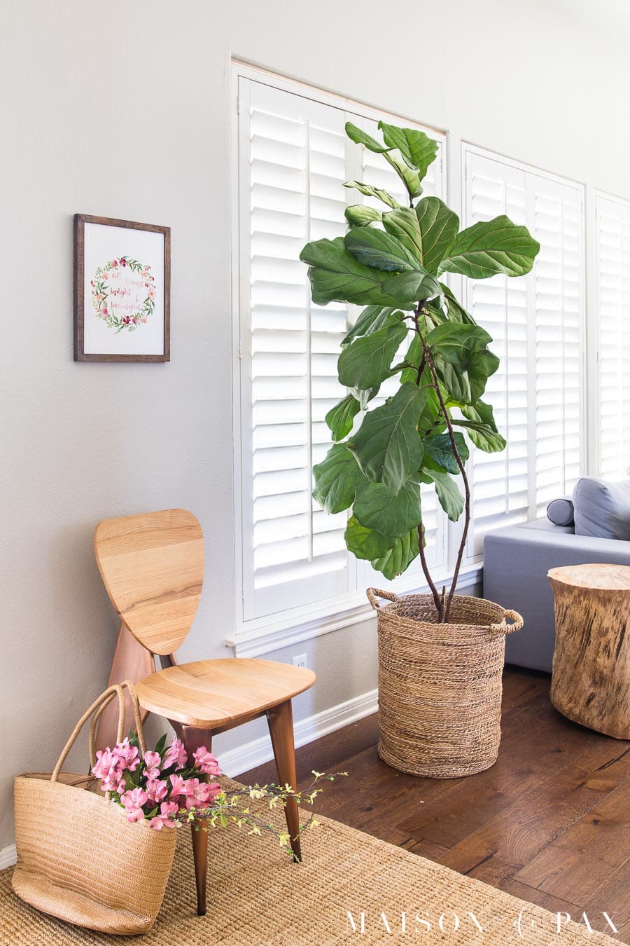 wooden chair with watercolor print above and fiddle leaf fig | Maison de Pax