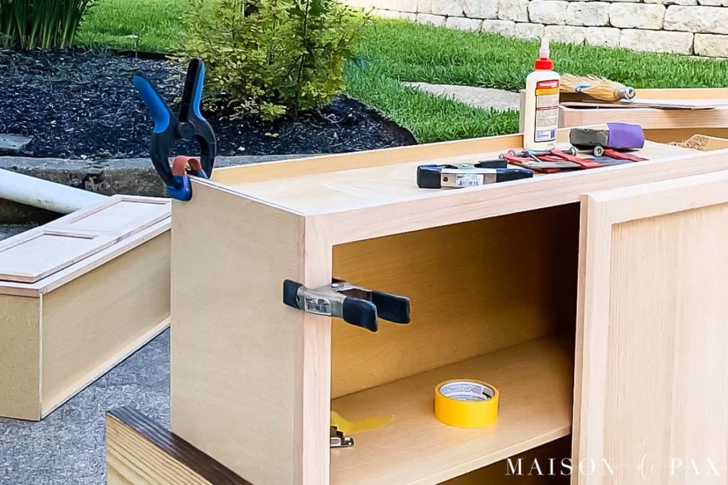 adding finished plywood to unfinished side of cabinet