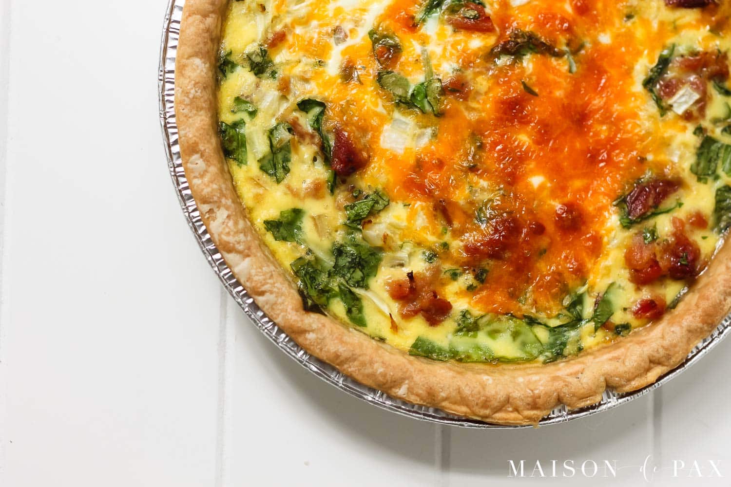 browned cheesy ham and spinach quiche