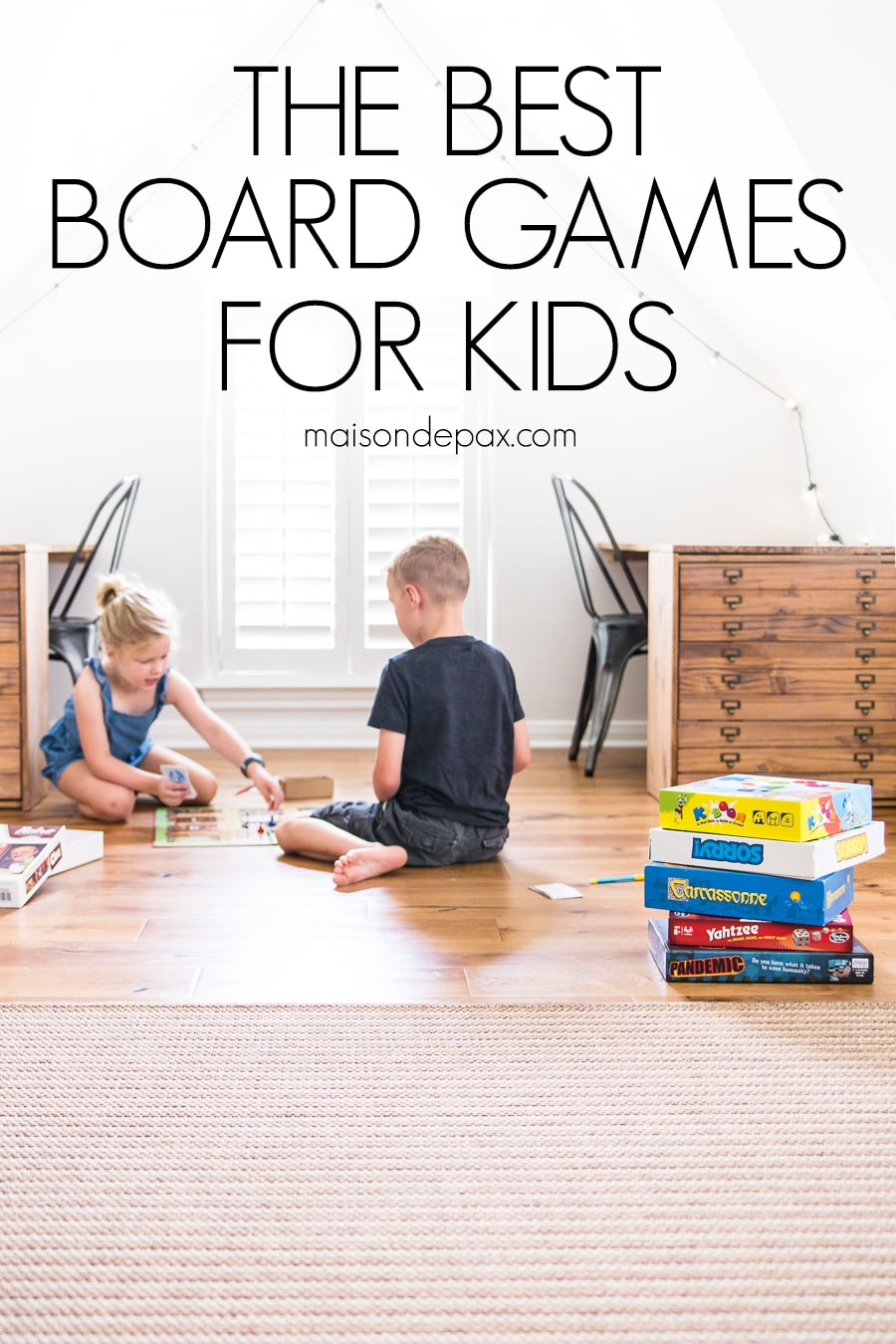 boy and girl playing board games on floor with overlay: the best board games for kids | aiweb9ygdry.cmersite.com