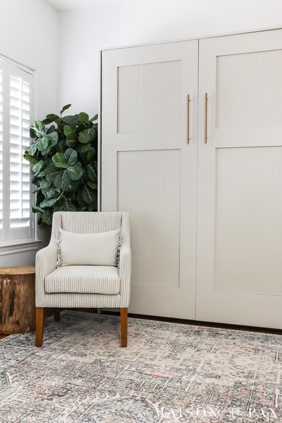 murphy bed cabinet with fluted doors in combo home office and guest room