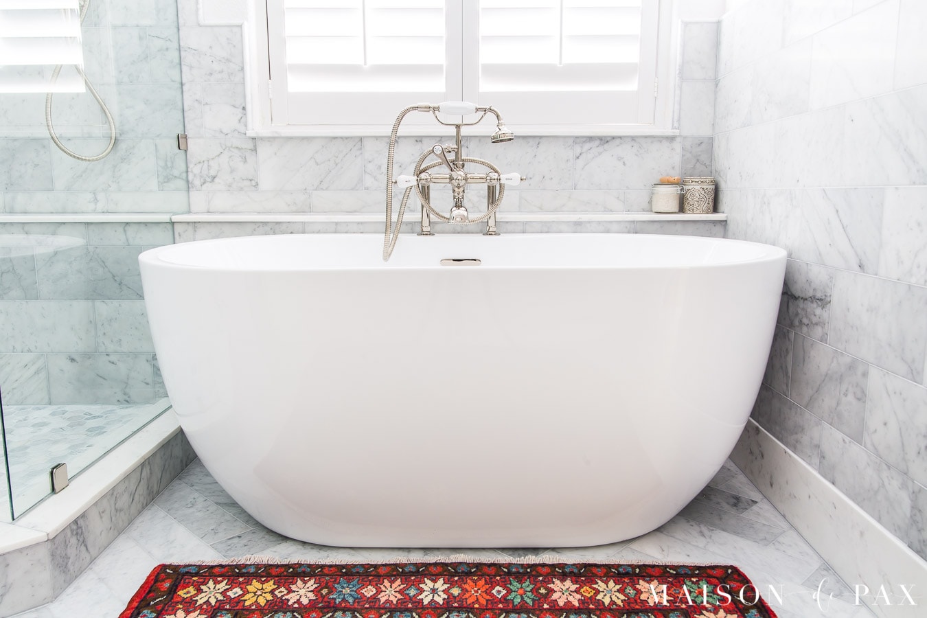 white freestanding tub under window | Maison de Pax