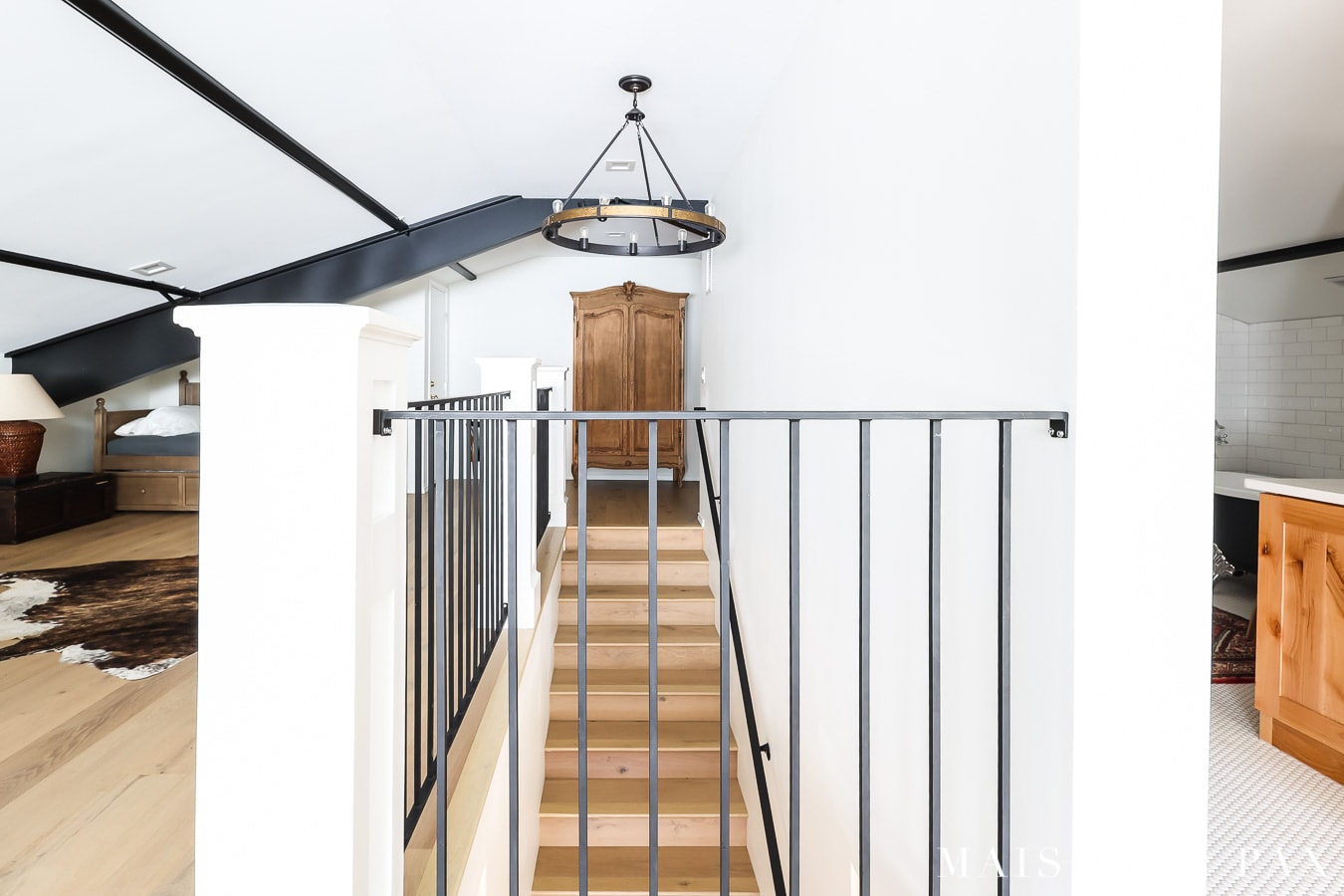 attic remodel with exposed metal beams