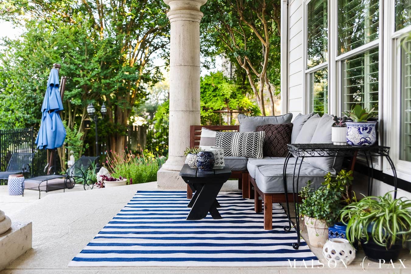 small wood patio sectional with gray cushions