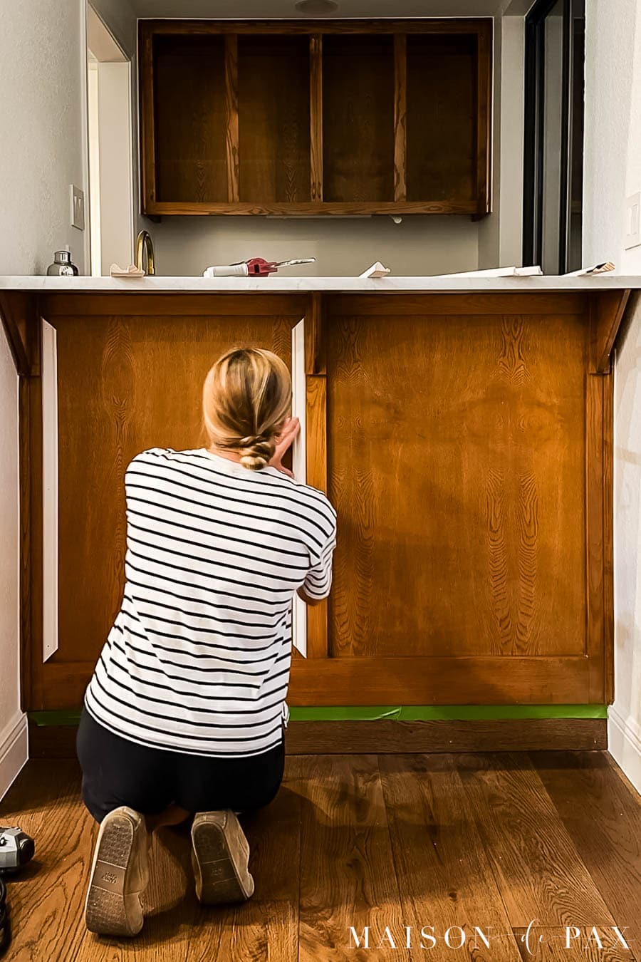 adding base cap molding to shaker paneling