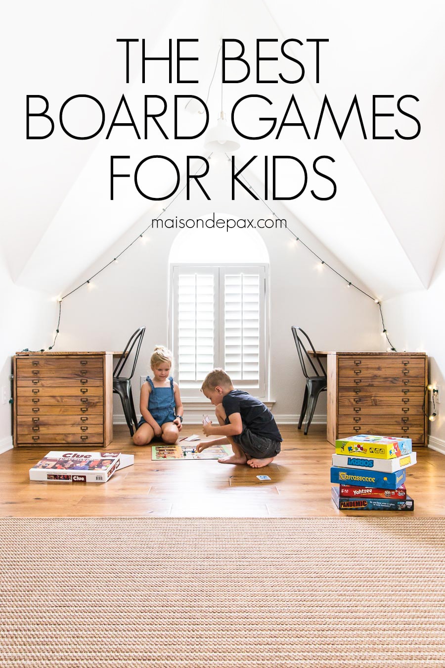 boy and girl playing board game with text overlay: the best board games for kids | Maison de Pax