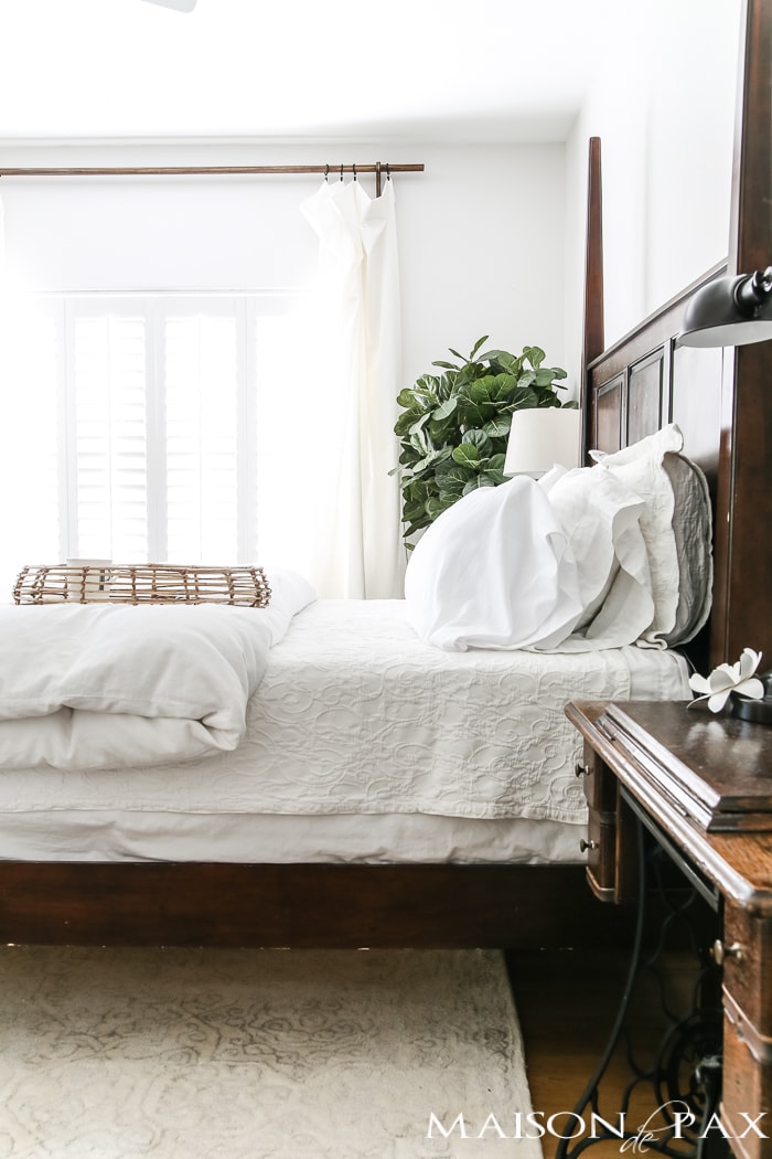 Relaxed, natural, neutral master bedroom with lots of white and touches of boho texture... the perfect retreat!