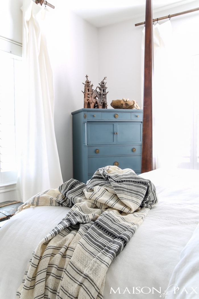 Relaxed, natural, neutral master bedroom with lots of white and touches of boho texture... the perfect retreat!