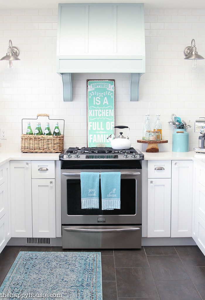 A Happy Kitchen: such a gorgeous aqua and white kitchen with beautiful, white counters and many diy elements