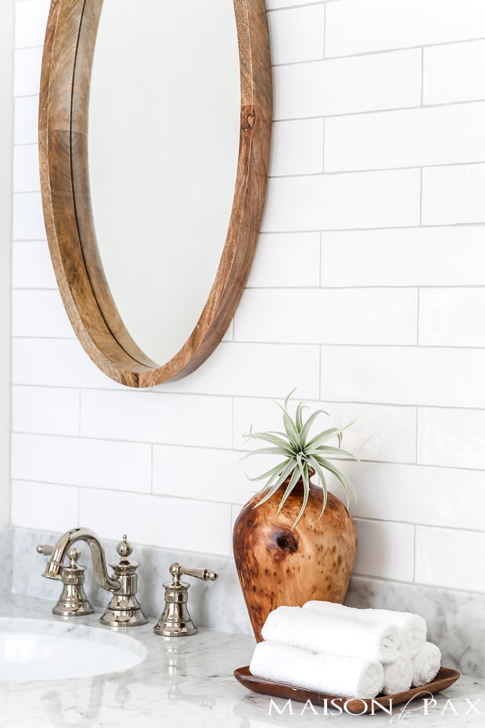 wood textures against glossy white tile and marble countertops- Maison de Pax
