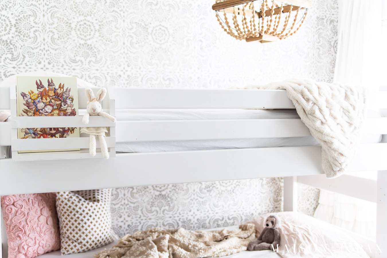 white bunk bed with neutral and pink accents | Maison de Pax