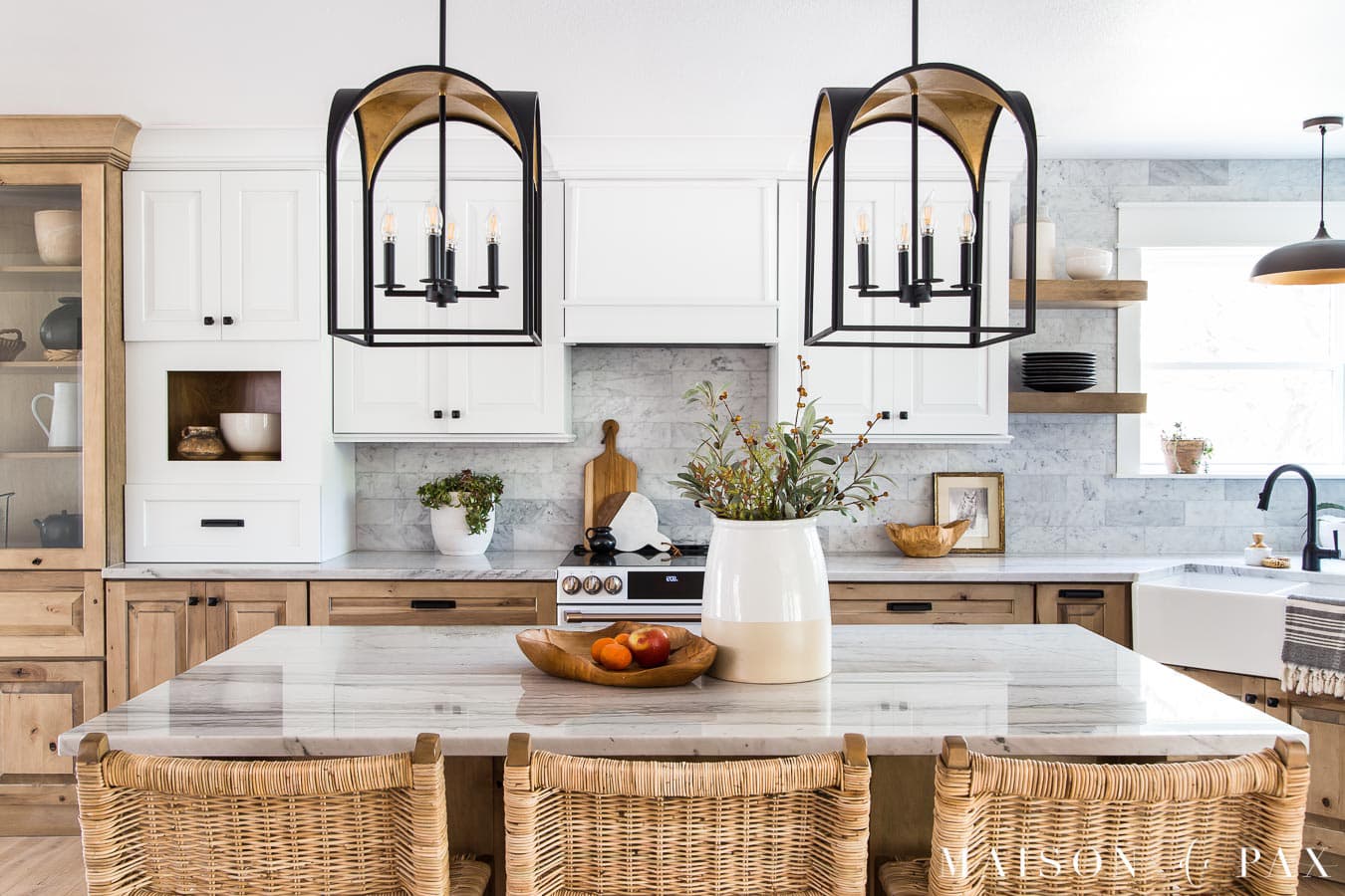 black and gold lantern pendant lighting above kitchen island | Maison de Pax