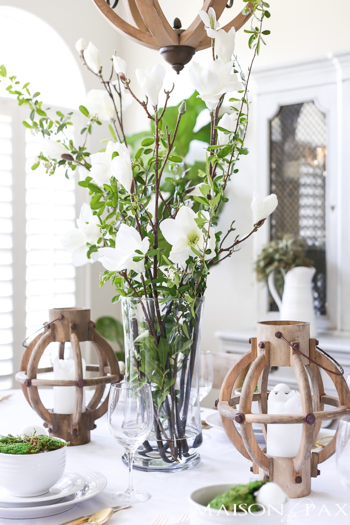 Looking for Easter table decorating ideas? This simple green and white Easter tablescape will bring a crisp, clean, serene feel to your space as you celebrate the new life that Easter has to offer.
