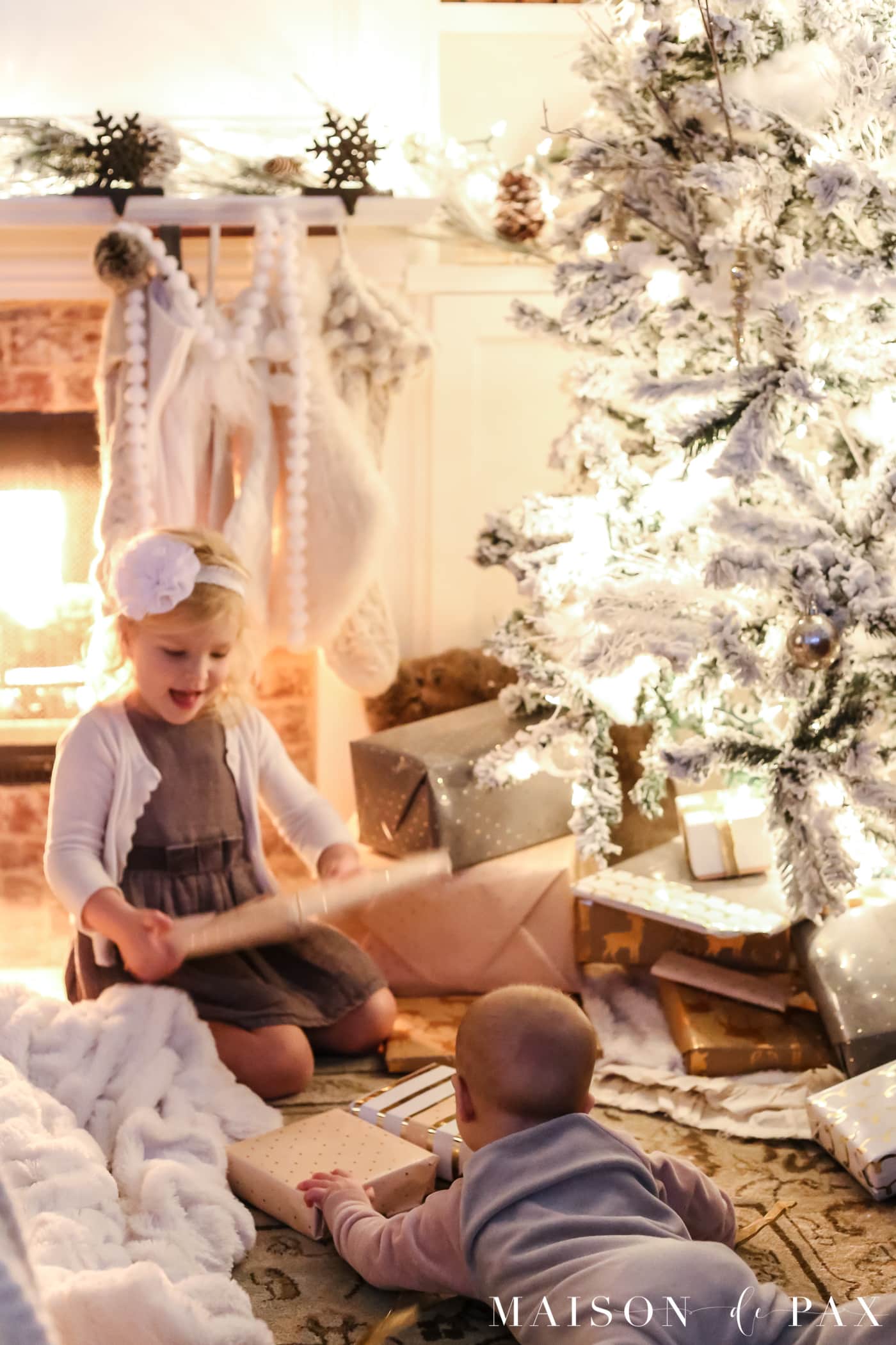 two little girls and the magic of christmas! gorgeous Christmas lights at night in these 25+ home tours #christmasnightstour #holidayhometour #christmaslights