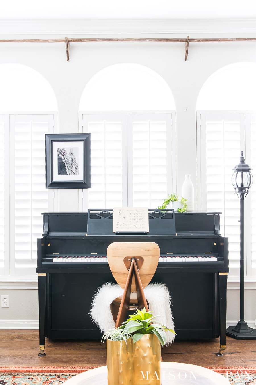 black and brass mid century piano | Maison de Pax