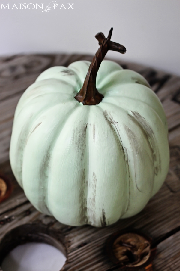 Try this paint and wax technique to make plastic pumpkins look like real heirloom pumpkins via aiweb9ygdry.cmersite.com #fall #paint #diy