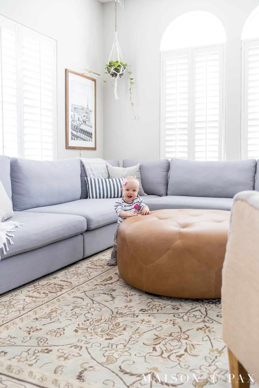 Bright living room design with sectional- Maison de Pax
