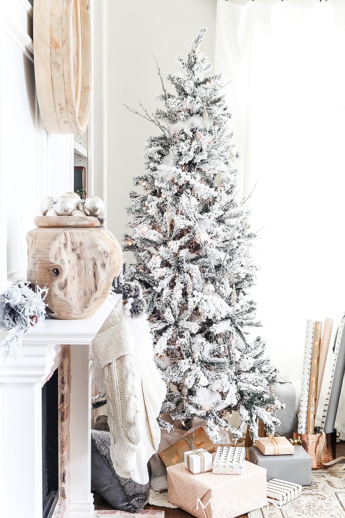 white and cream and blush Christmas decorations: mantel, flocked tree, stockings #neutralChristmasdecor