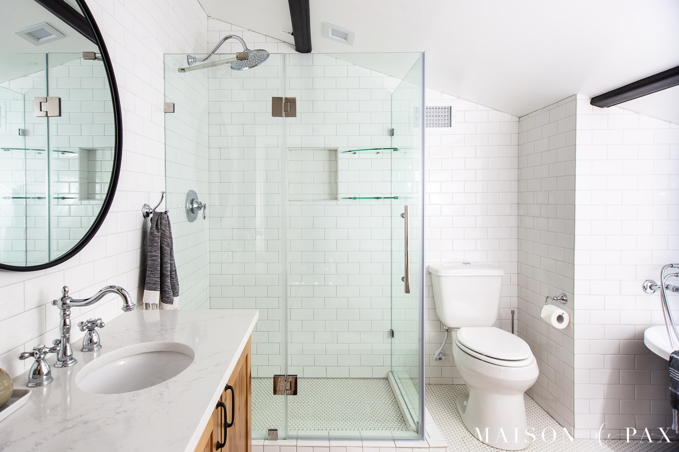 white subway tile walls with frameless shower enclosure | Maison de Pax