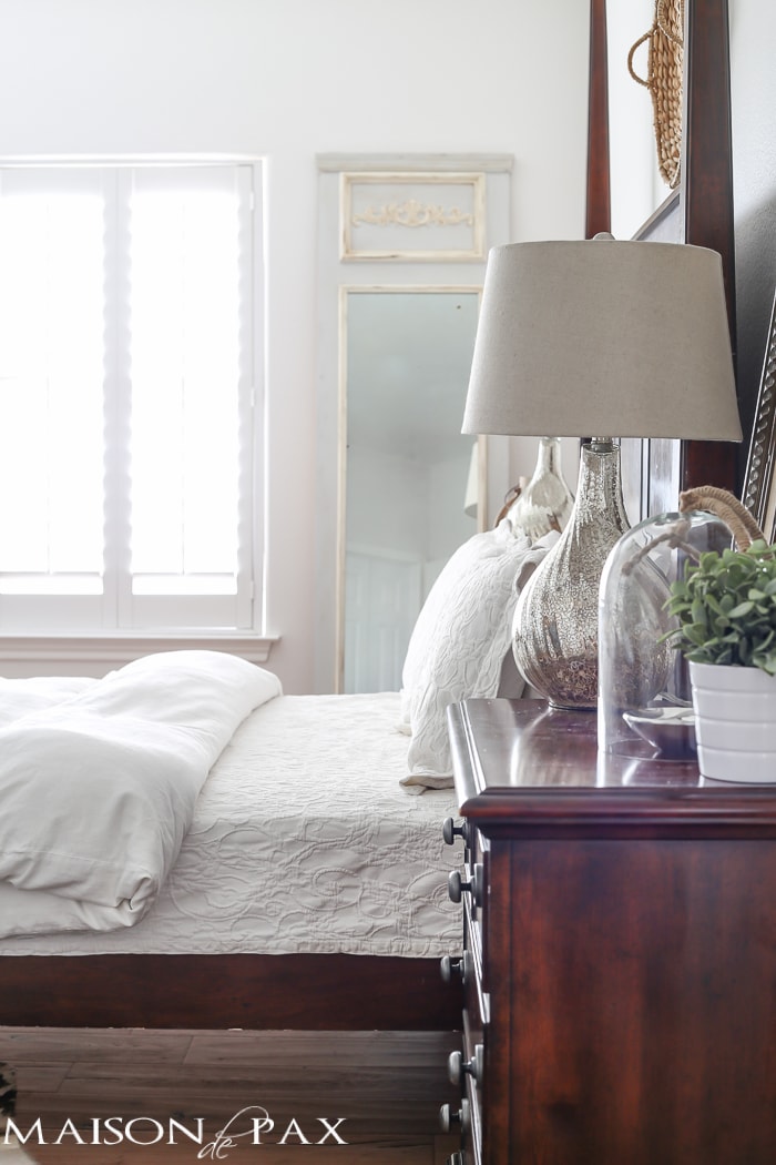 lovely, calming white master bedroom with natural wood tones and textures throughout | aiweb9ygdry.cmersite.com