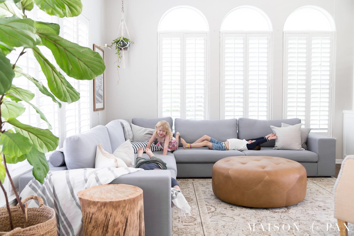 Bright living room design with sectional- Maison de Pax