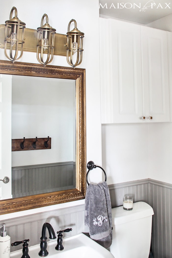gorgeous rustic, chic bathroom: gold mirror, rustic wood towel rack... perfect balance of high and low | aiweb9ygdry.cmersite.com