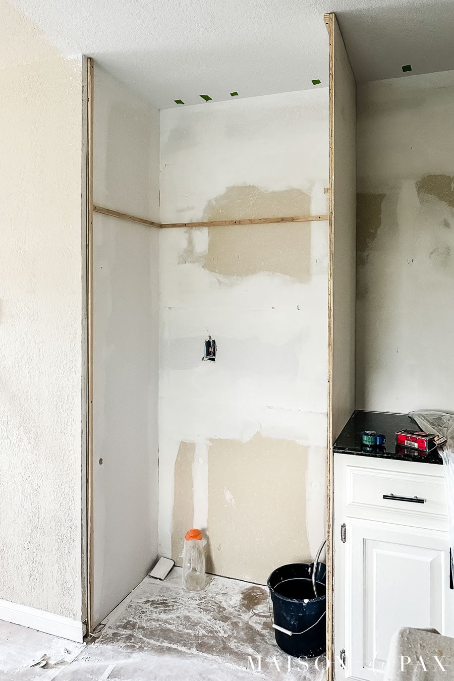 cleats for supporting a shelf above a refrigerator