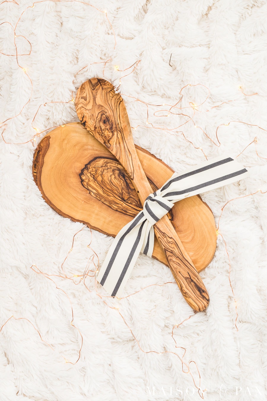 root wood mini serving tray and serving spoon tied together with a ribbon