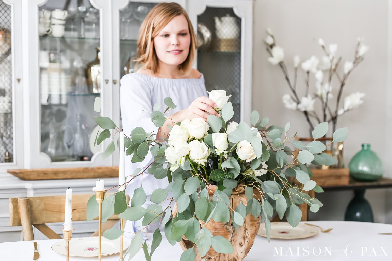 DIY centerpiece with white roses and eucalyptus