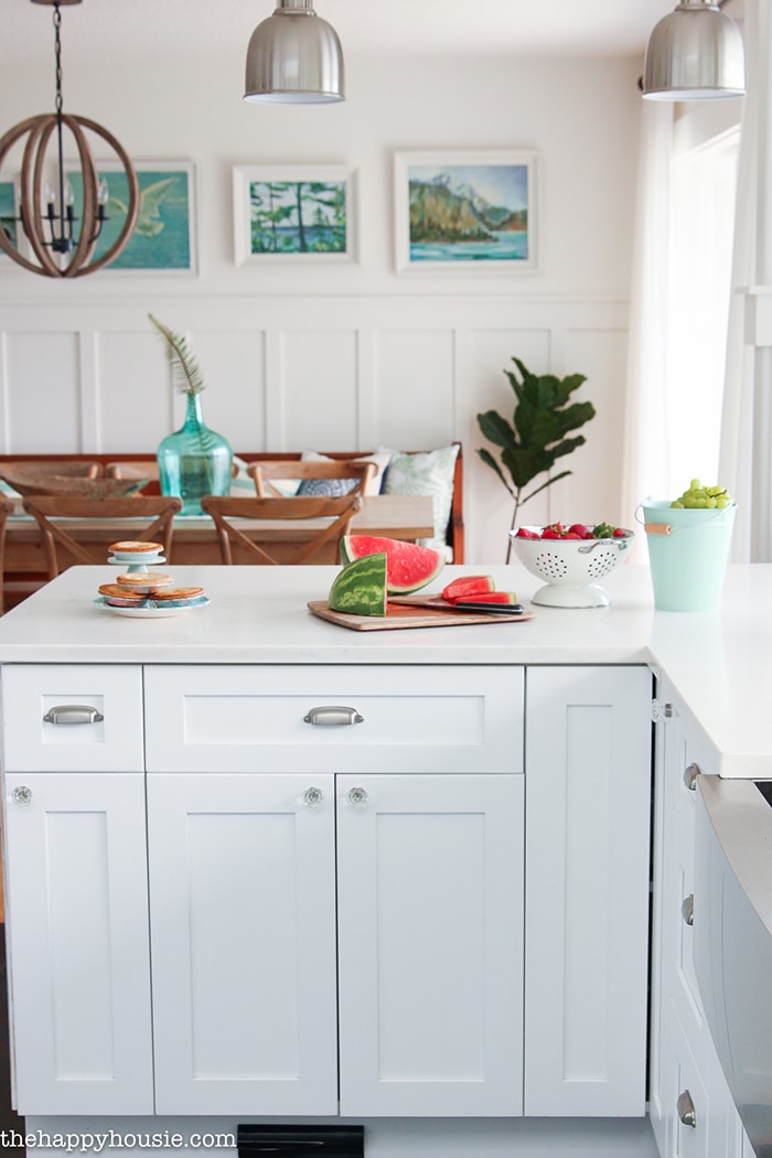 A Happy Kitchen: such a gorgeous aqua and white kitchen with beautiful, white counters and many diy elements