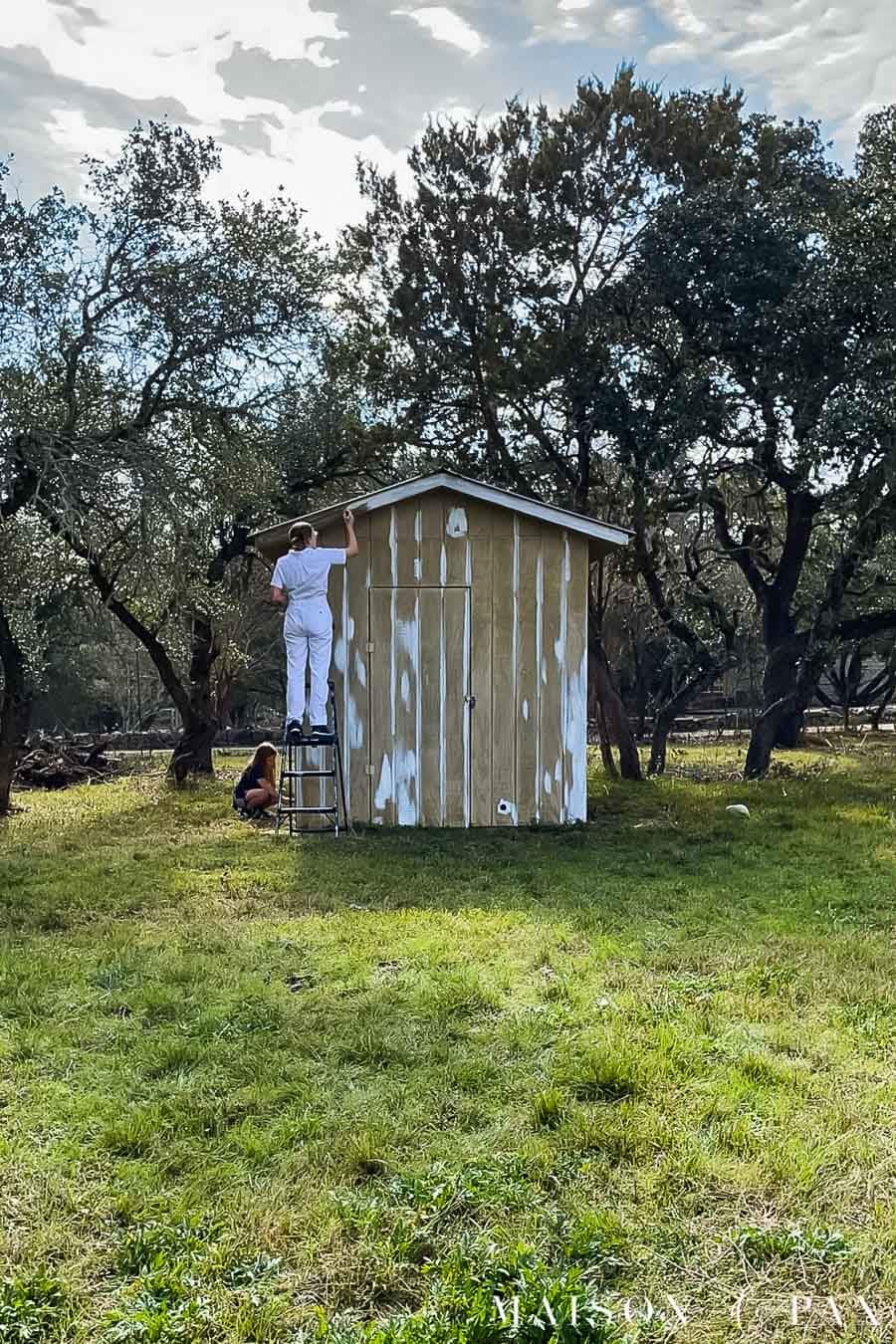 priming the exterior of a shed
