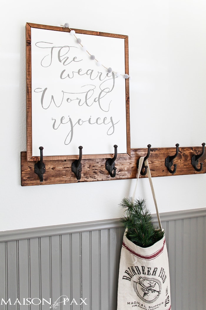 DIY Christmas sign: learn how to make your own beautiful hand painted sign on canvas framed with a simple wooden frame | aiweb9ygdry.cmersite.com