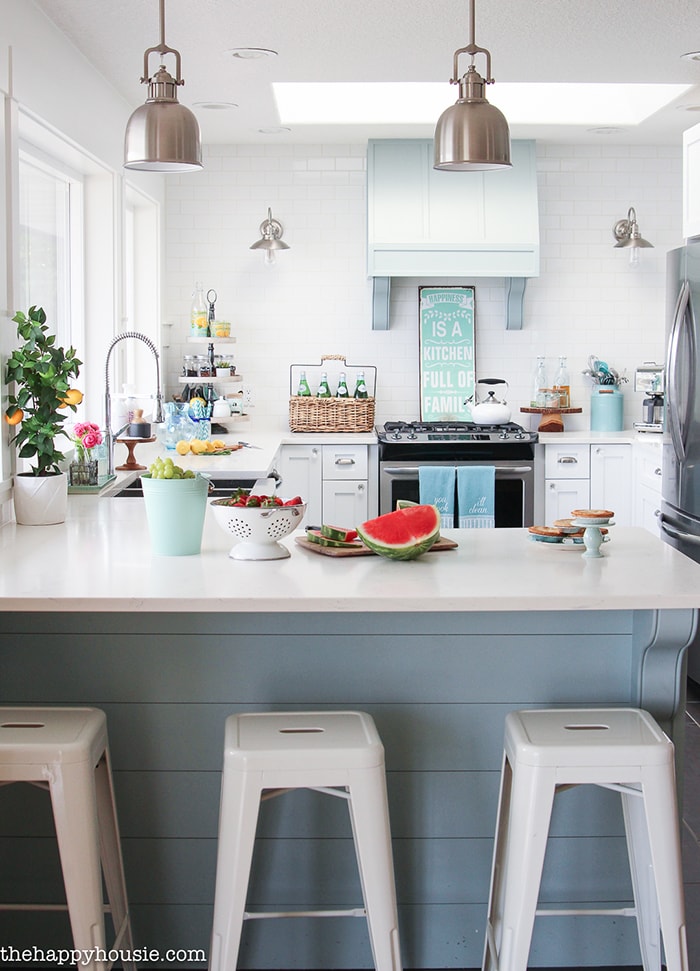 A Happy Kitchen: such a gorgeous aqua and white kitchen with beautiful, white counters and many diy elements
