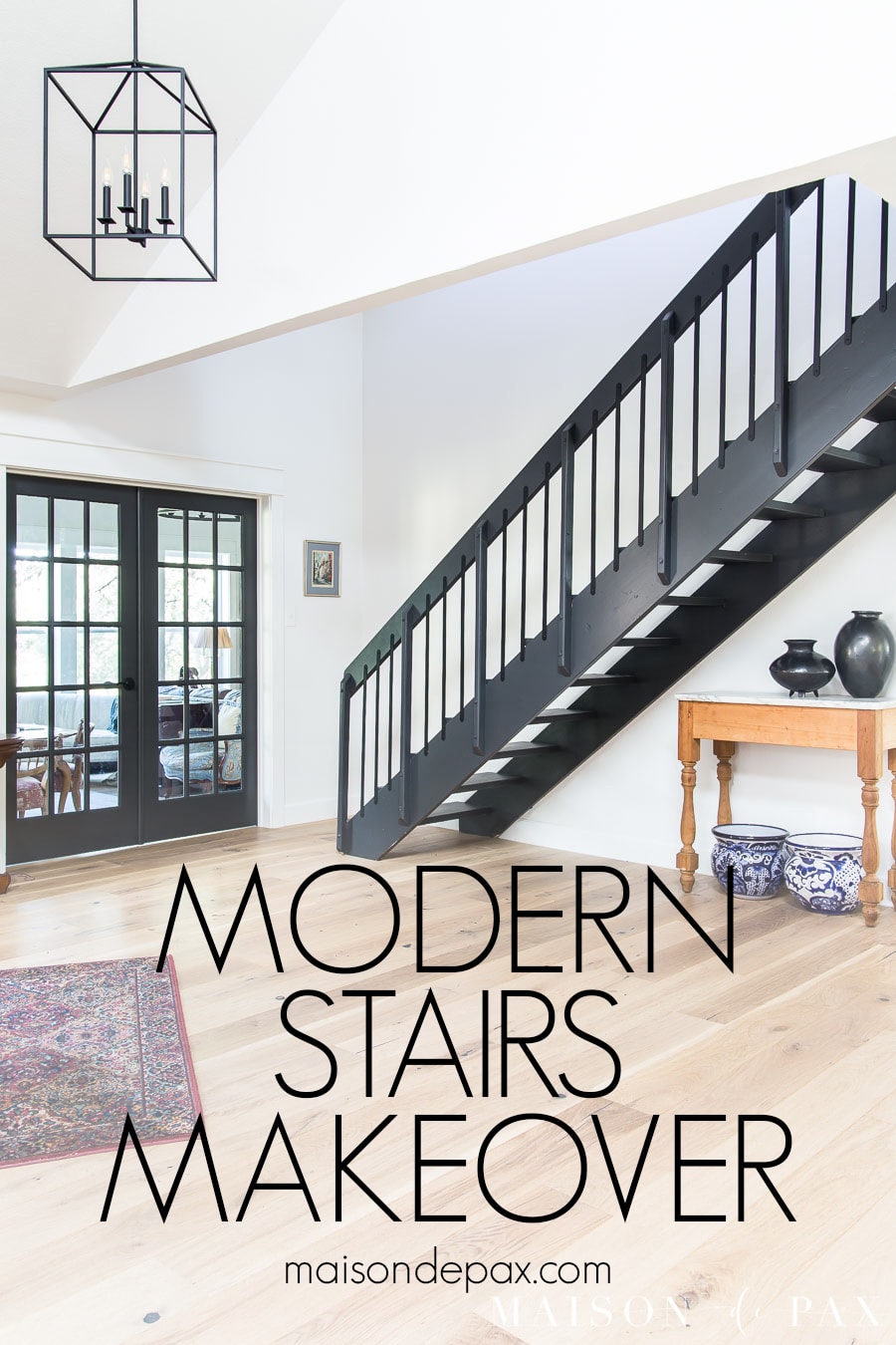 modern stairs makeover with black iron railing and balusters